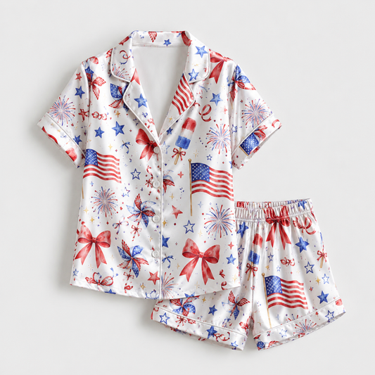 PJ-M006-White Satin Sleepwear Coordinate Featuring Patriotic Flags Fireworks Pinwheels And Festive Red Bows