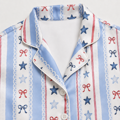 PJ-M007-Coquette Inspired Blue Striped Satin Sleepwear Featuring Red Bows Delicate Lace And Star Motifs